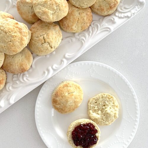 classic scones served with jam on plate