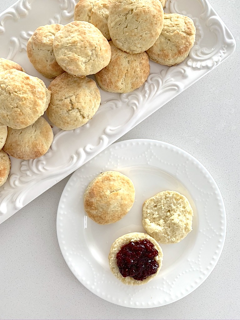 classic scones served with jam on plate