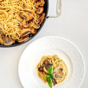 Linguine ai funghi mushroom linguine topped with sautéed mushrooms, Parmesan, and fresh basil