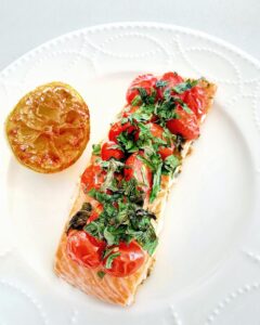 baked salmon with cherry tomatoes and herbs