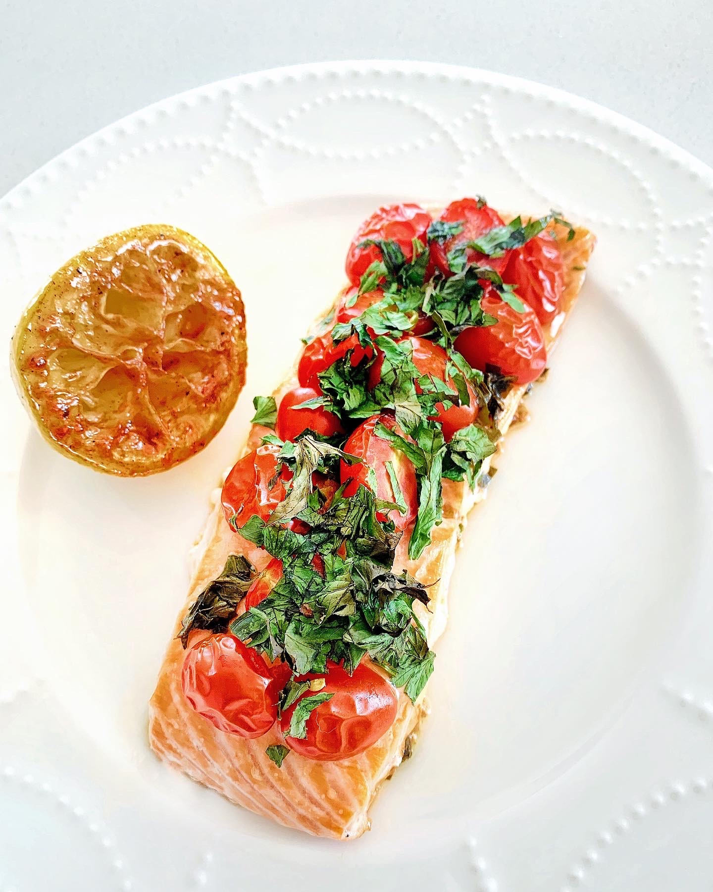 baked salmon with cherry tomatoes and herbs