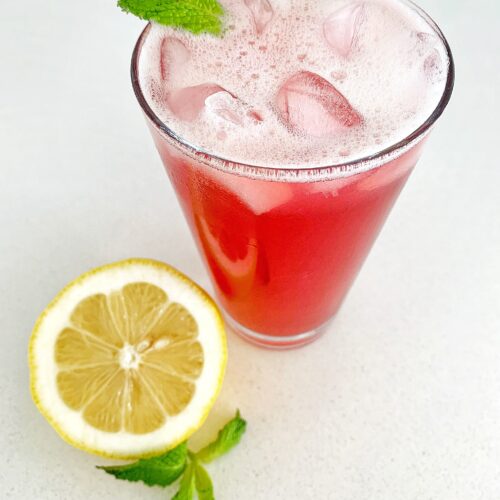 pink iced tea lemonade with ice and mint