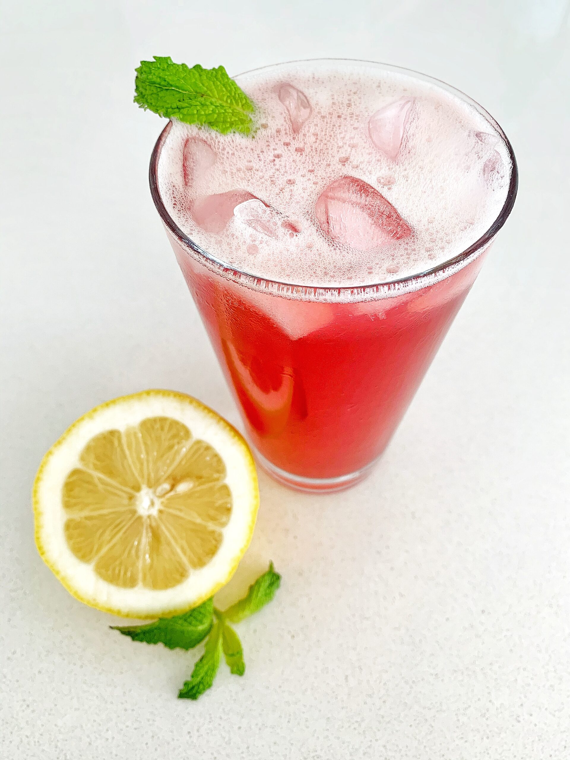 pink iced tea lemonade with ice and mint