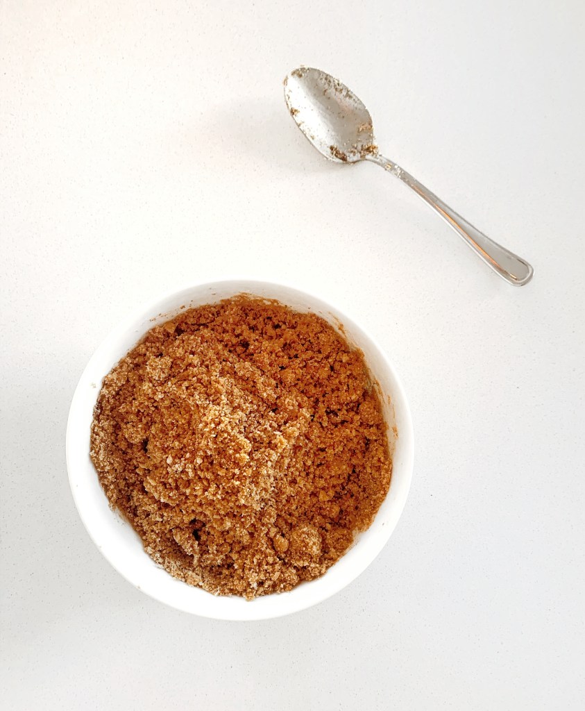 Brown sugar measured in a bowl for making pumpkin pie filling.”