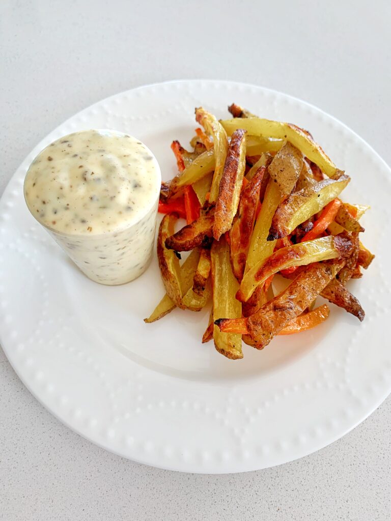 Homemade truffle aioli served with potato fries.